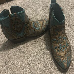 Turquoise and tan  leather half boots.